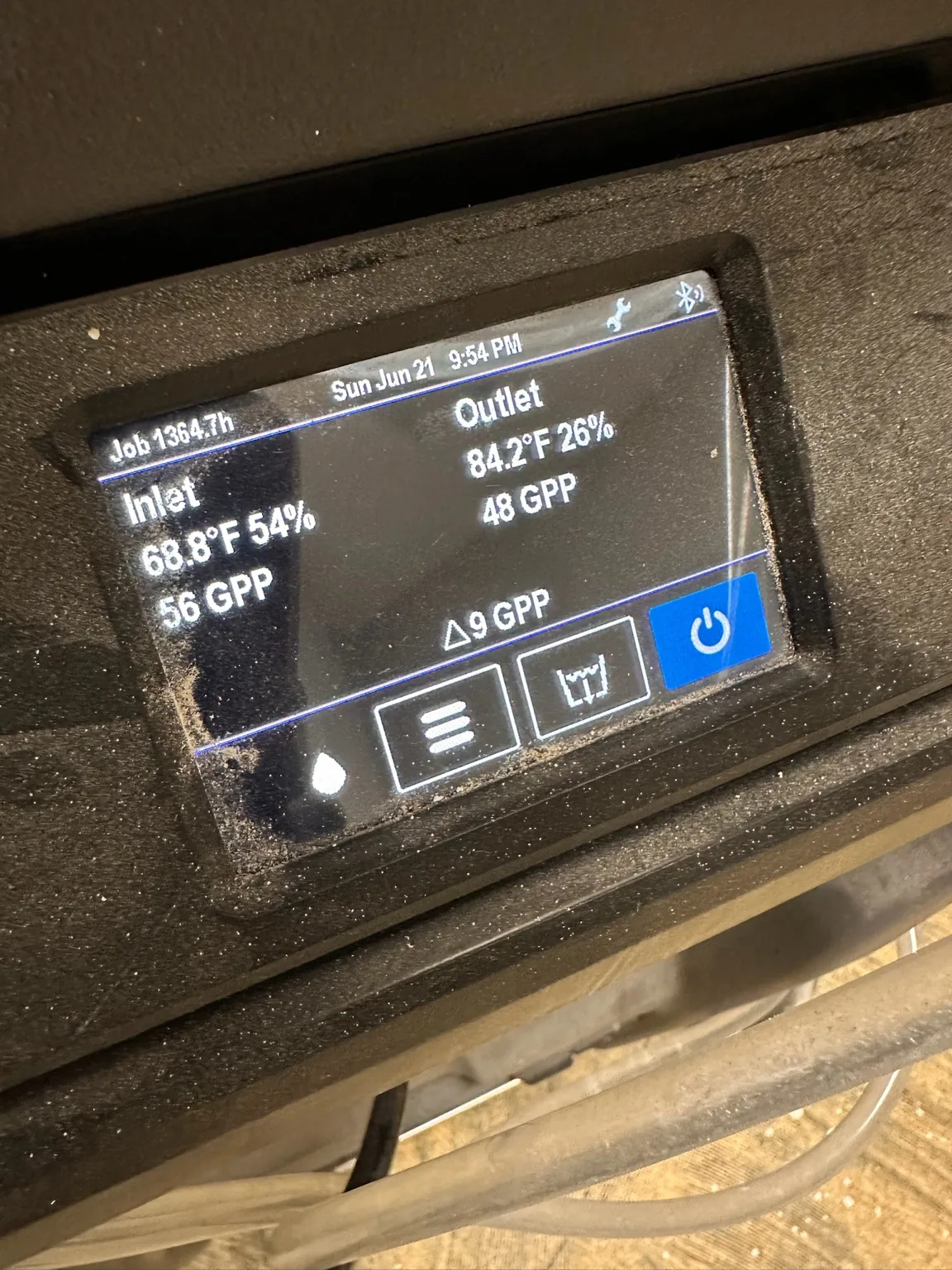 A second dehumidifier performance screen showing inlet/outlet conditions.