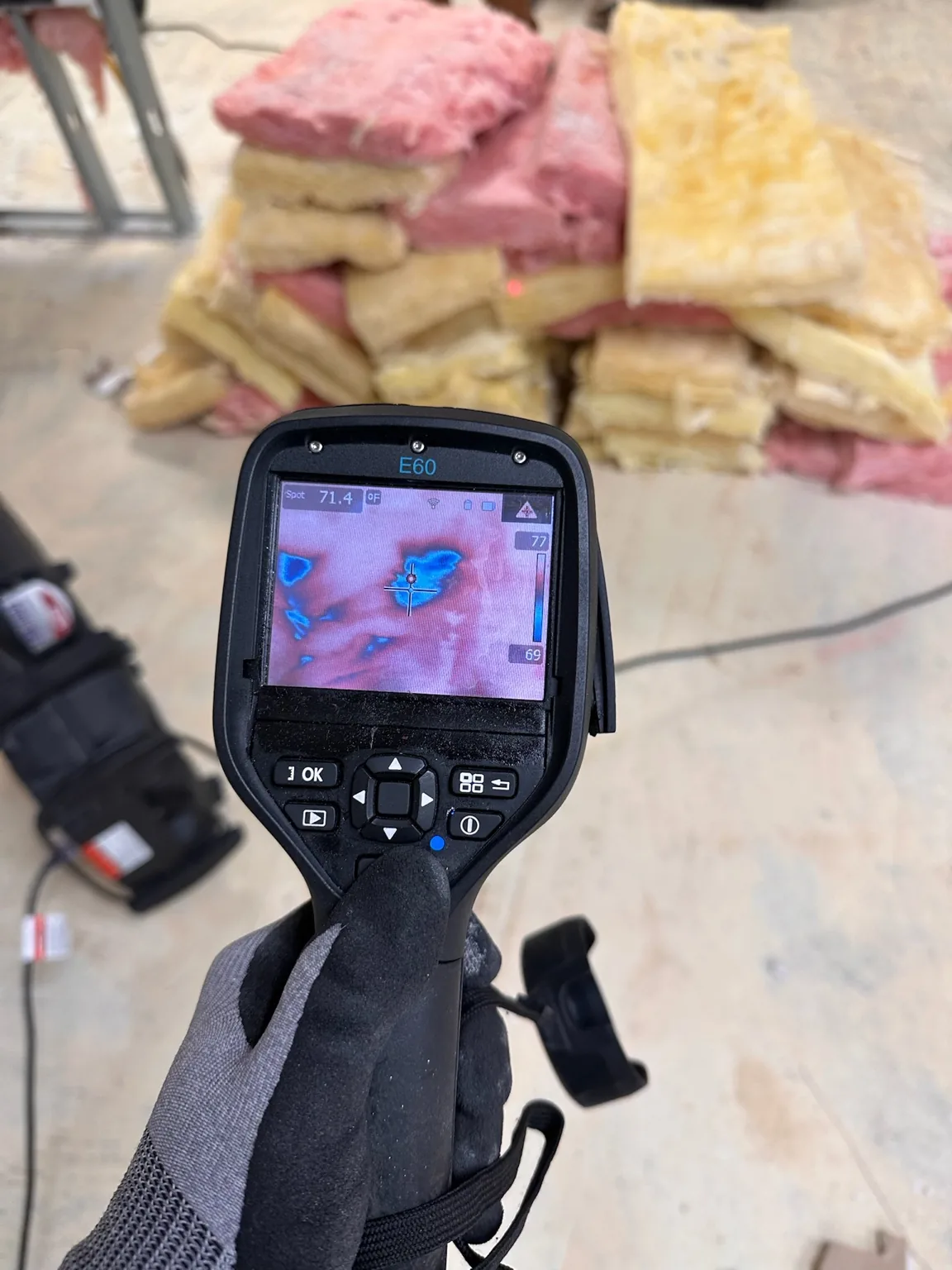 Thermal inspection with removed insulation visible in the work area.