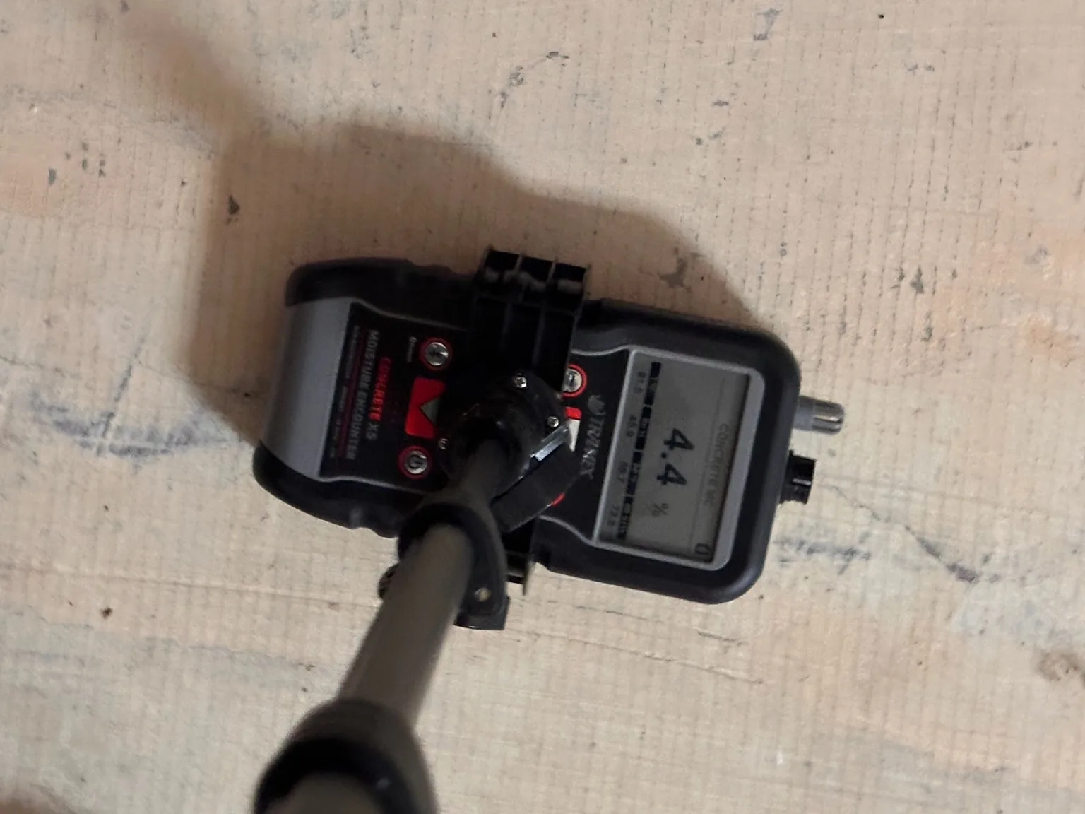 Concrete moisture-comparison reading documented at one substrate location.