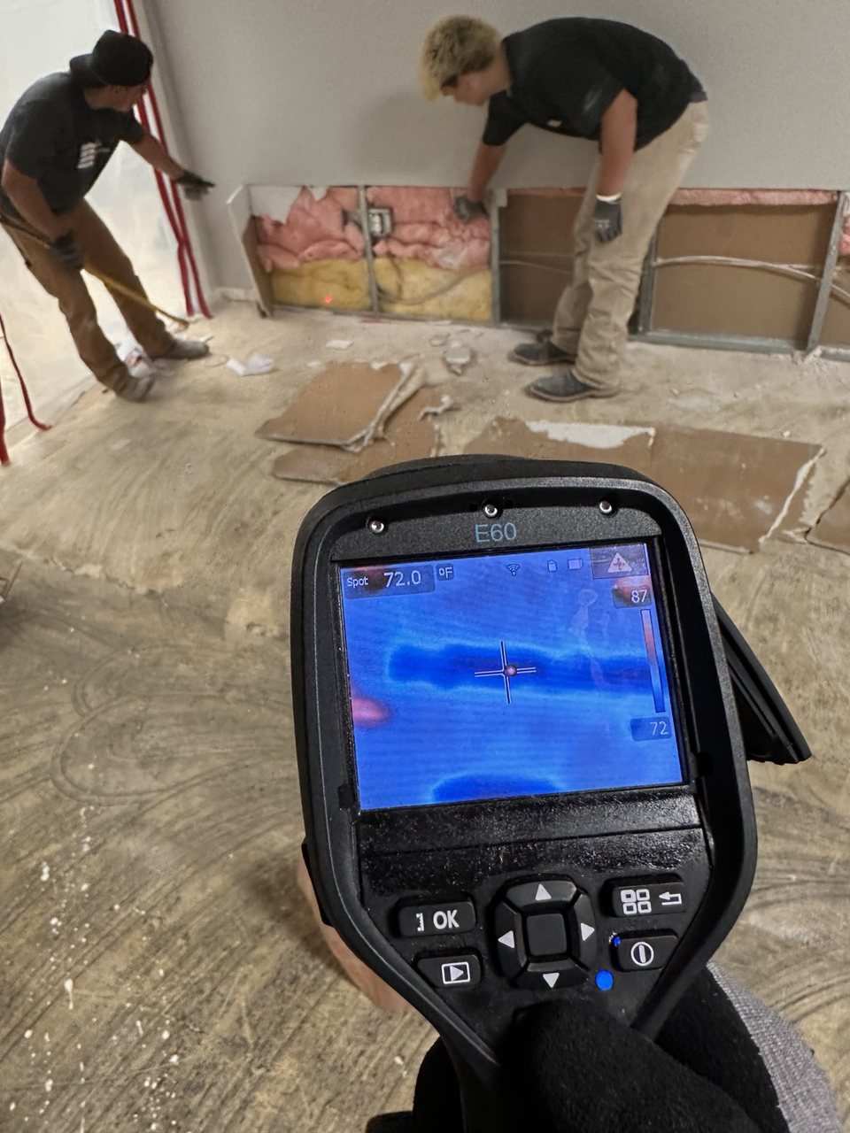 Same Day Mitigation technicians performing controlled demolition with infrared thermal imaging guidance